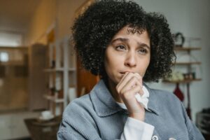 Woman waiting for the other shoe to drop