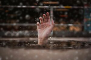 hand rising out of water